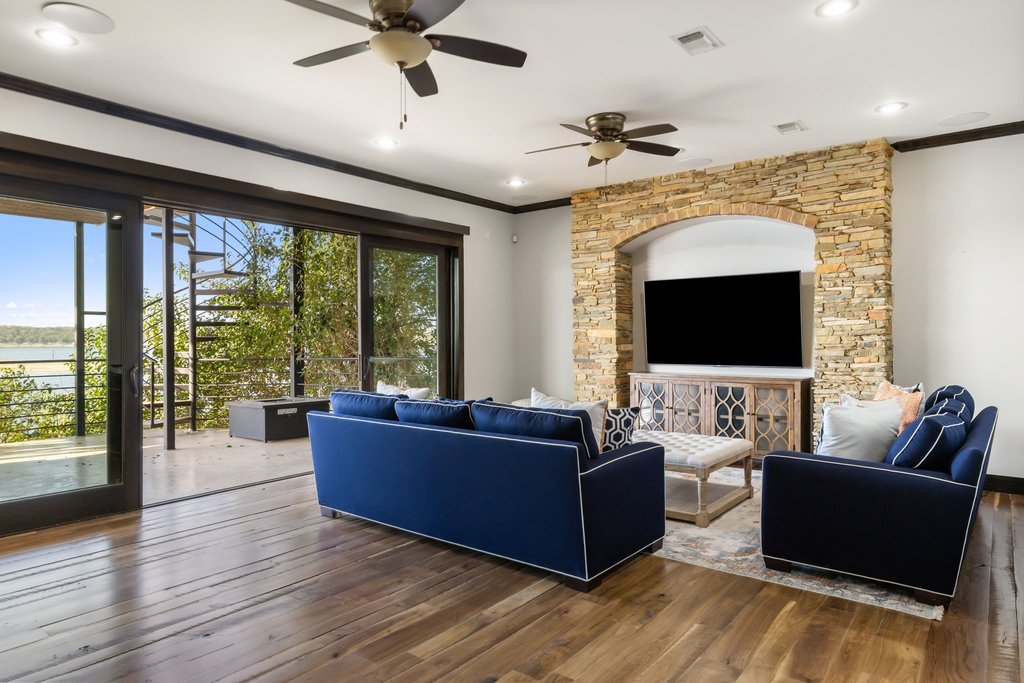 1606 Buffalo Gap Road Austin, TX 78734 - Photo 28 of 40 a living room with furniture fireplace and a flat screen tv