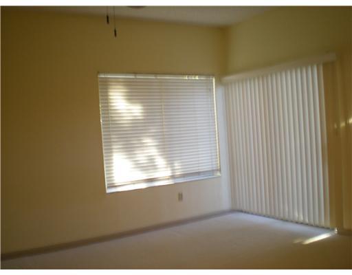 763 St Albans Drive, Unit 19 Boca Raton, FL 33486 - Photo 5 of 7 a view of an empty room with a window