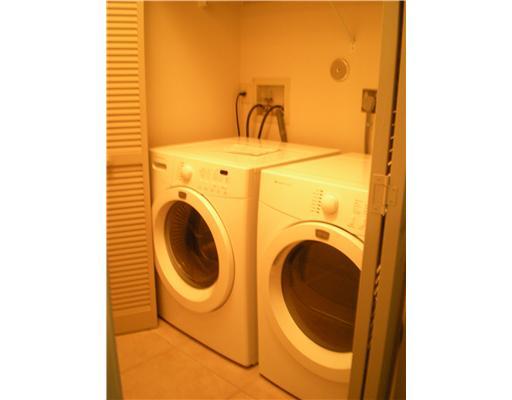 763 St Albans Drive, Unit 19 Boca Raton, FL 33486 - Photo 7 of 7 a utility room with dryer and washer