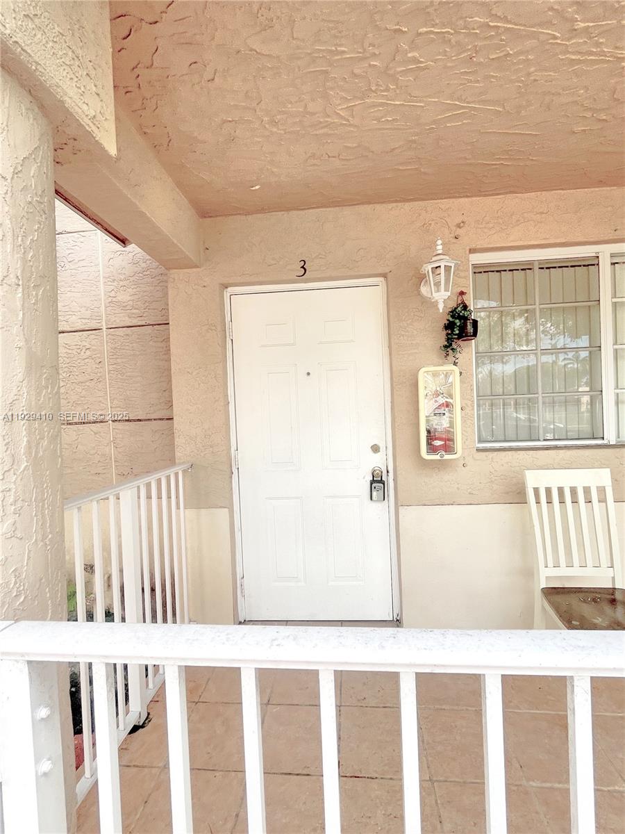 220 East 4th Street, Unit 3 Hialeah, FL 33010 - Photo 2 of 22 a black and white photo of a living room