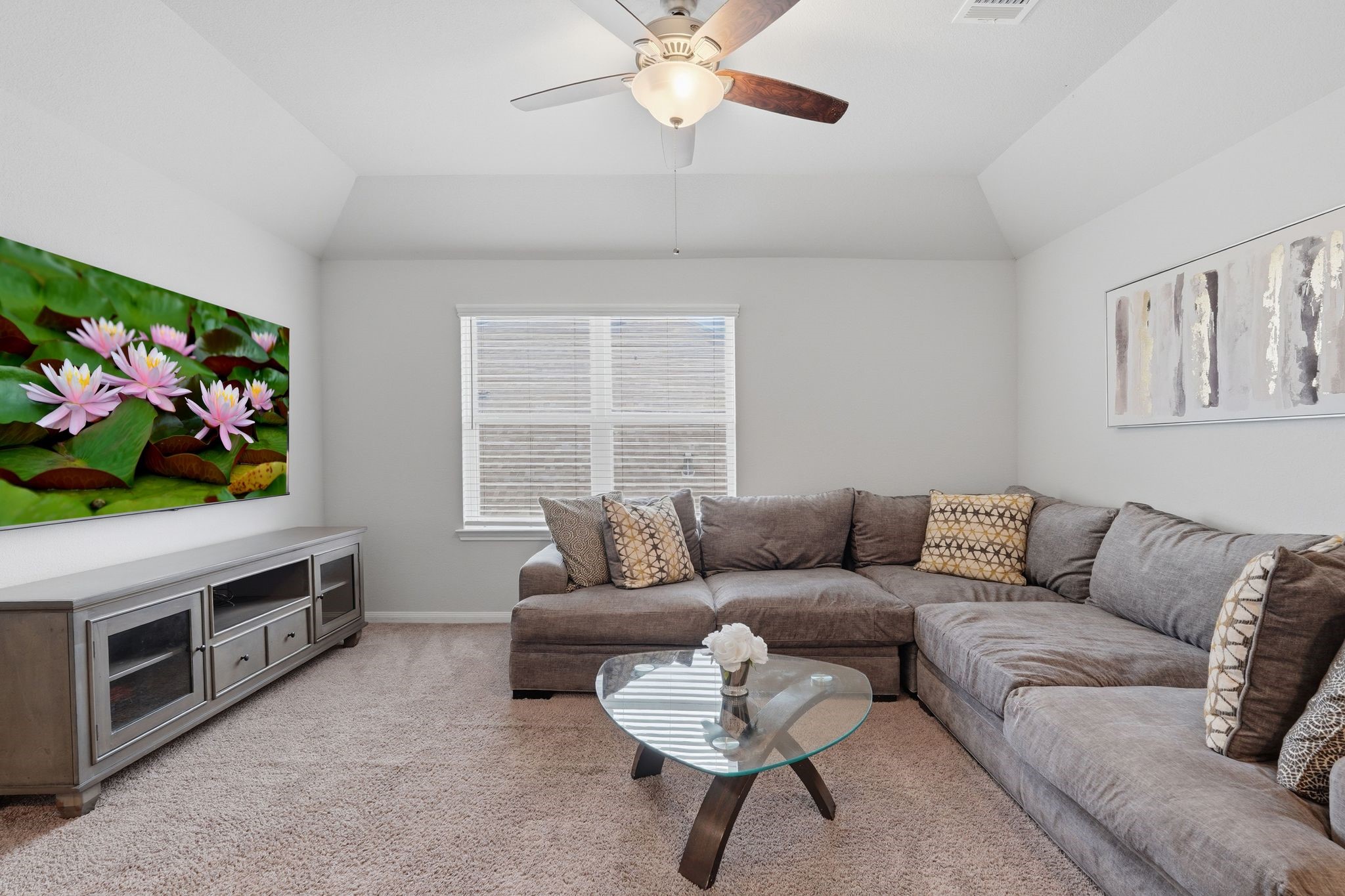 7522 Windsor View Drive Spring, TX 77379 - Photo 19 of 49 Another view of the lounge area showcasing bright atmosphere and flexible setup options.