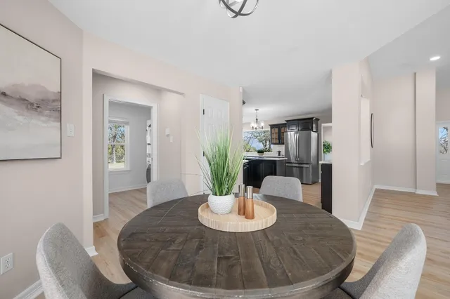 a view of a dining room with furniture