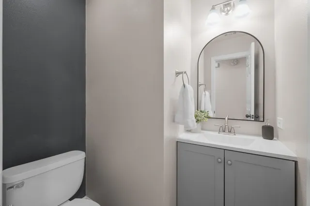 a view of a bedroom with washer and dryer