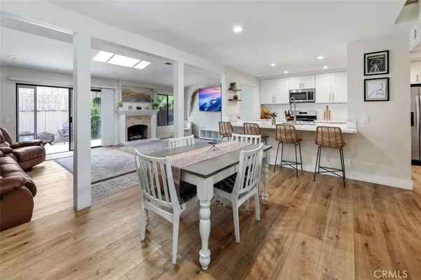 a view of kitchen with cabinets and wooden floor