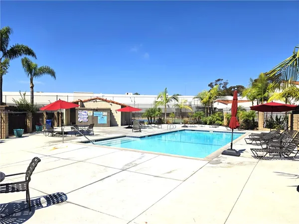 a view of a swimming pool with a patio