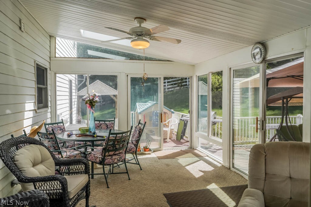 842 Dunning Road Canal Fulton, OH 44614 - Photo 29 of 35 Back sunporch with skylights and deck access.