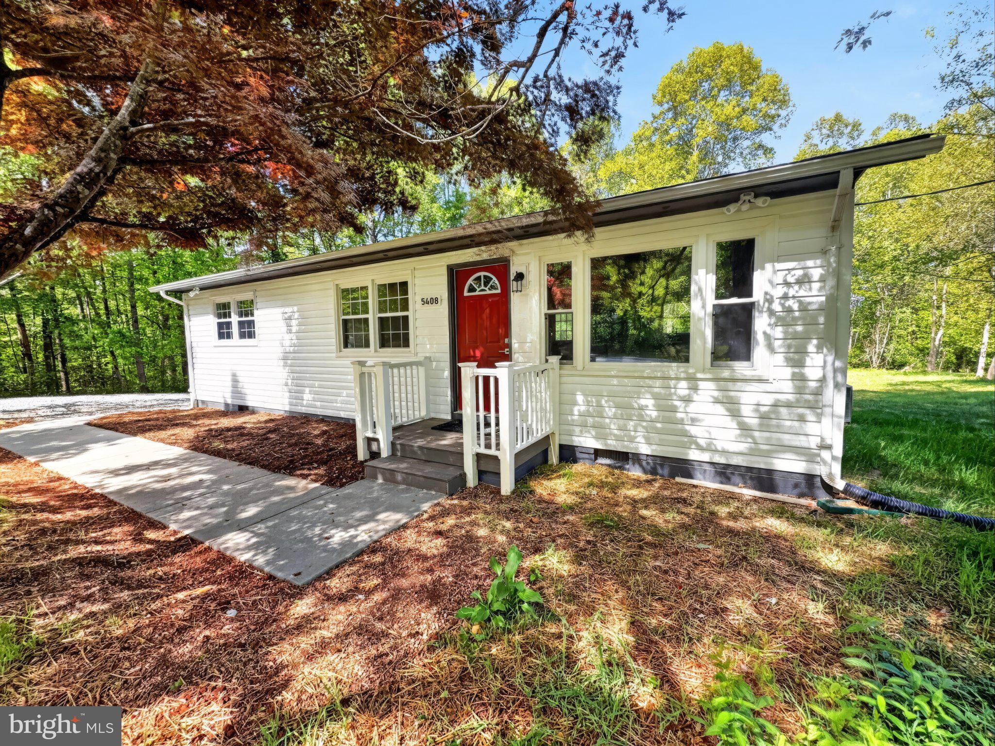 front view of a house with a patio