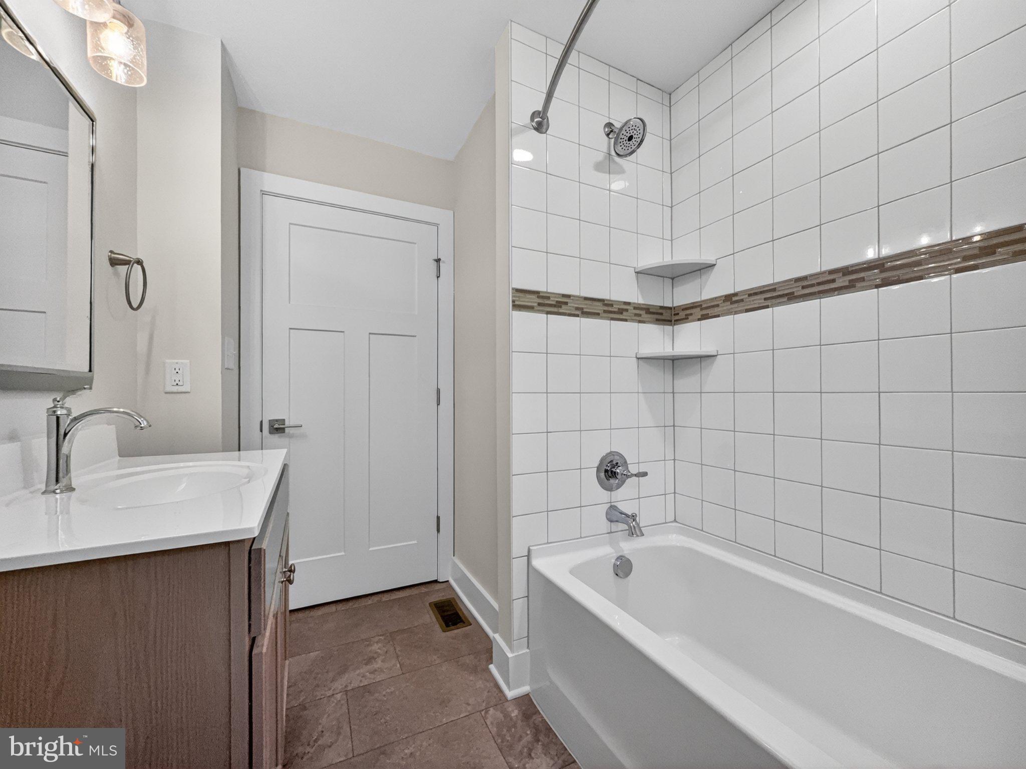 5408 Towles Mill Road Partlow, VA 22534 - Photo 22 of 24 a bathroom with a tub a sink and mirror