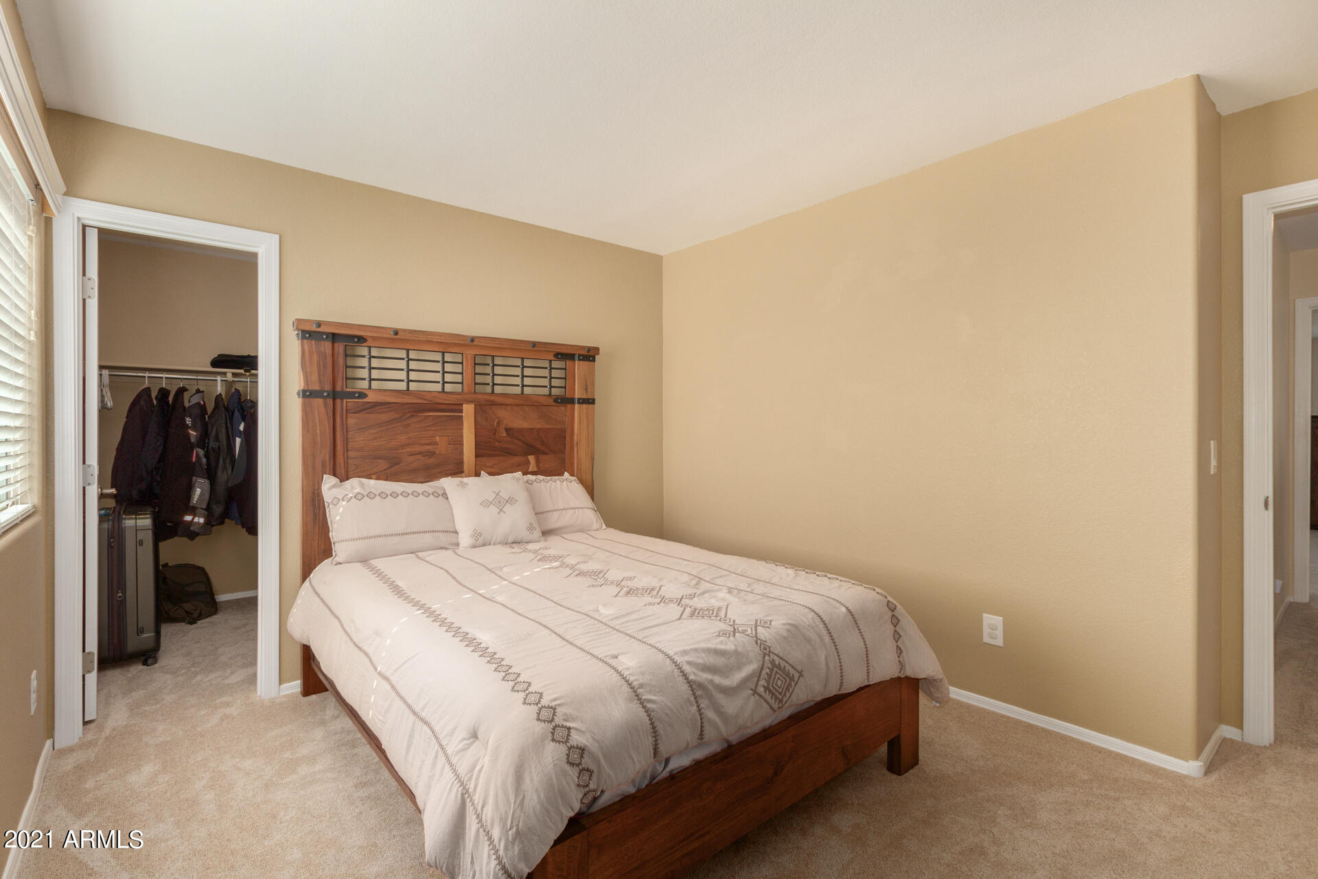 1250 South Palm Street Gilbert, AZ 85296 - Photo 26 of 45 a bedroom with a bed and a closet