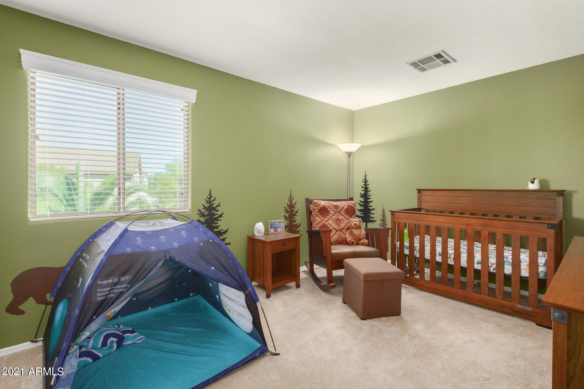 1250 South Palm Street Gilbert, AZ 85296 - Photo 27 of 45 a bedroom with a bed and a window
