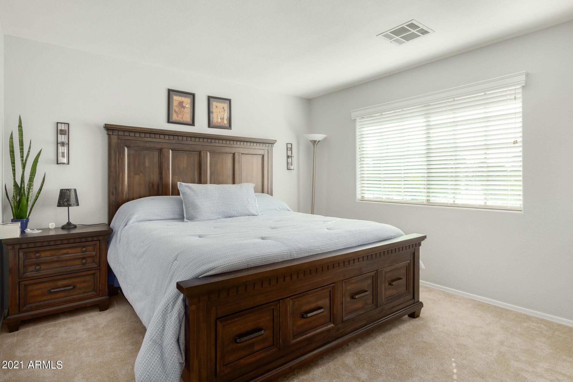 1250 South Palm Street Gilbert, AZ 85296 - Photo 28 of 45 a bedroom with a bed and a window