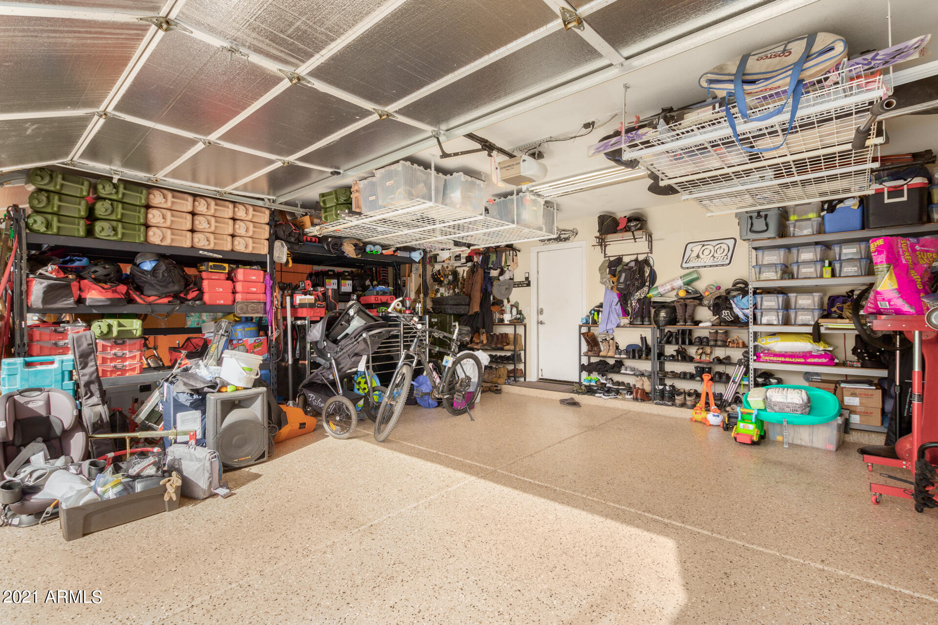 1250 South Palm Street Gilbert, AZ 85296 - Photo 31 of 45 a view of a storage room with a lot of stuff