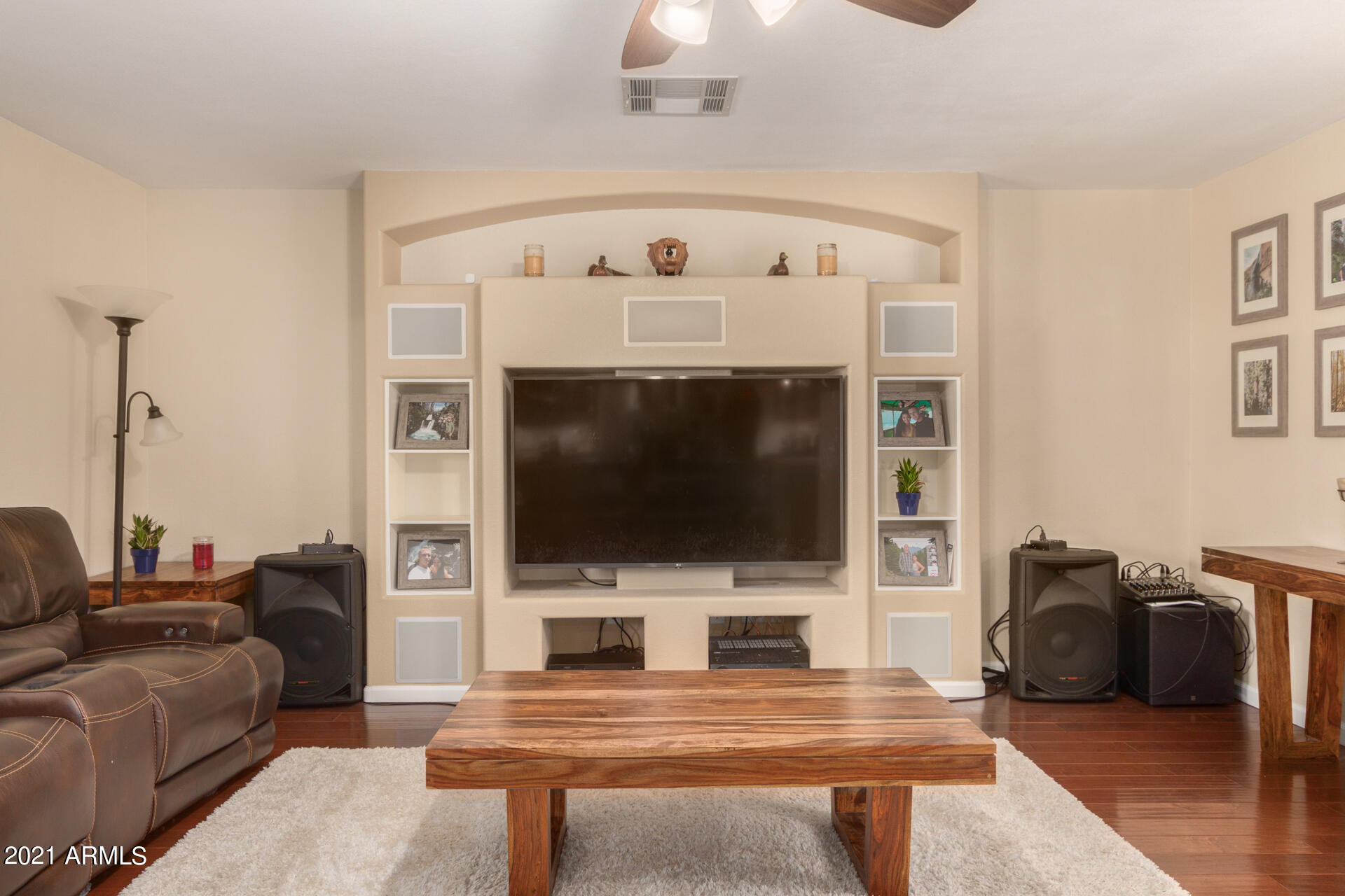 1250 South Palm Street Gilbert, AZ 85296 - Photo 6 of 45 a living room with furniture and a flat screen tv
