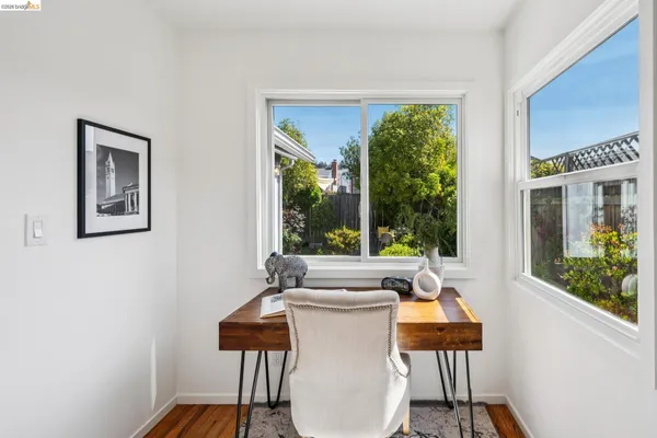 a view of a bedroom with furniture window and outside view