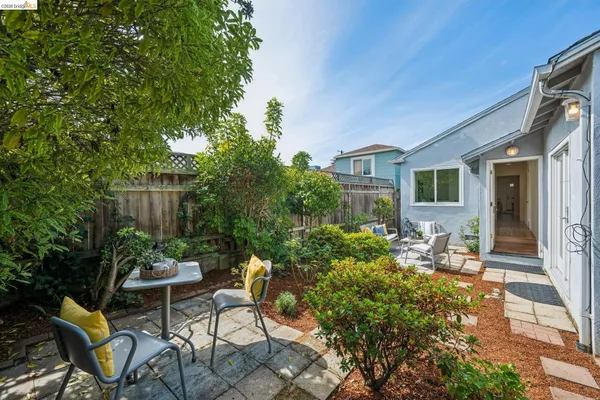 a house view with sitting space and garden space