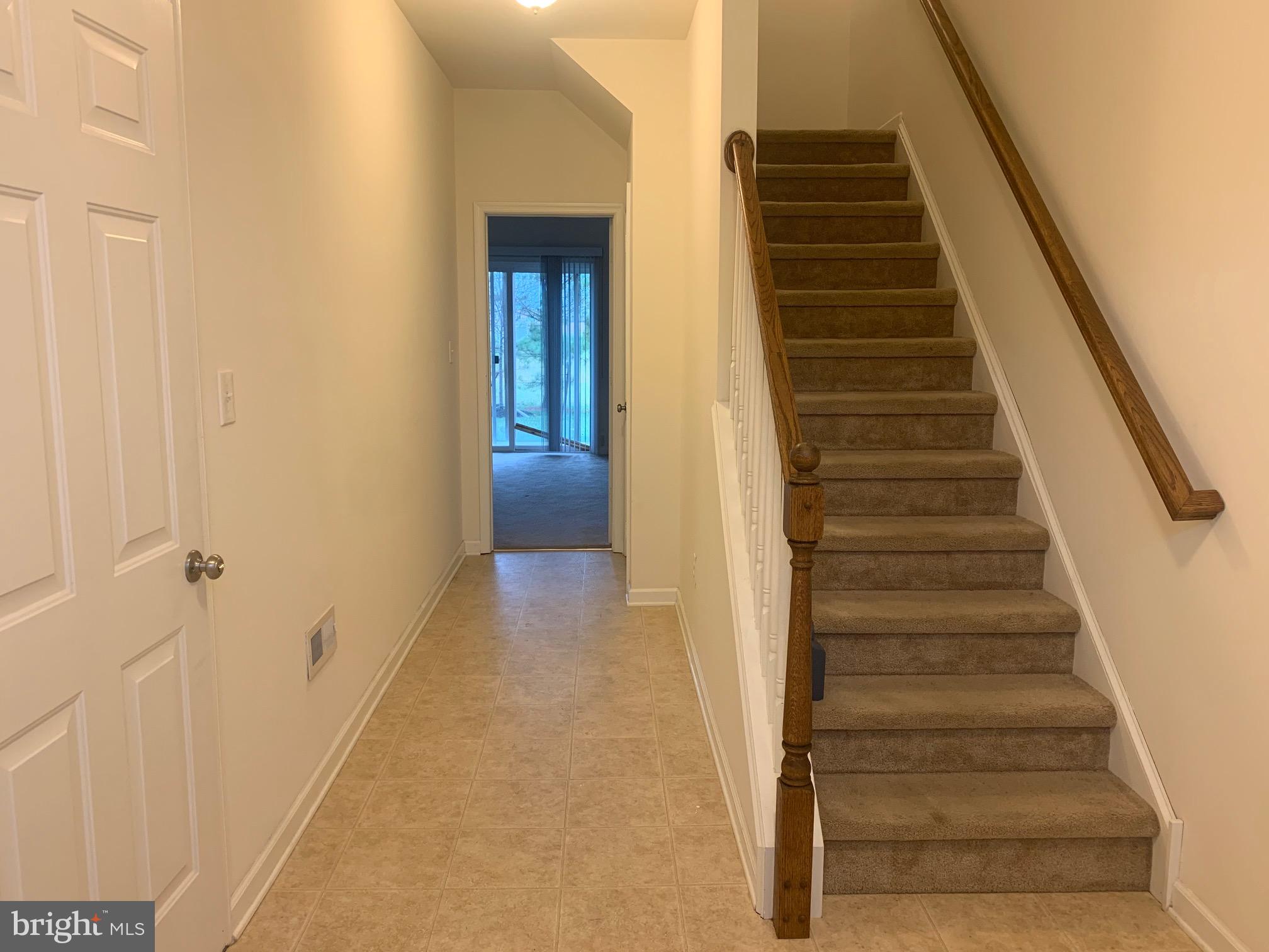 2156 Audubon Trail Middletown, DE 19709 - Photo 2 of 8 a view of a hallway with front door