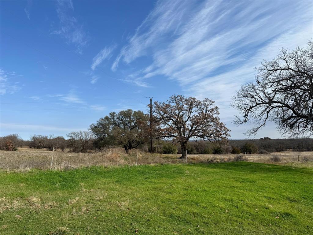 2202 County Road 3657 Springtown, TX 76082 - Photo 11 of 34 a view of a field with sitting area