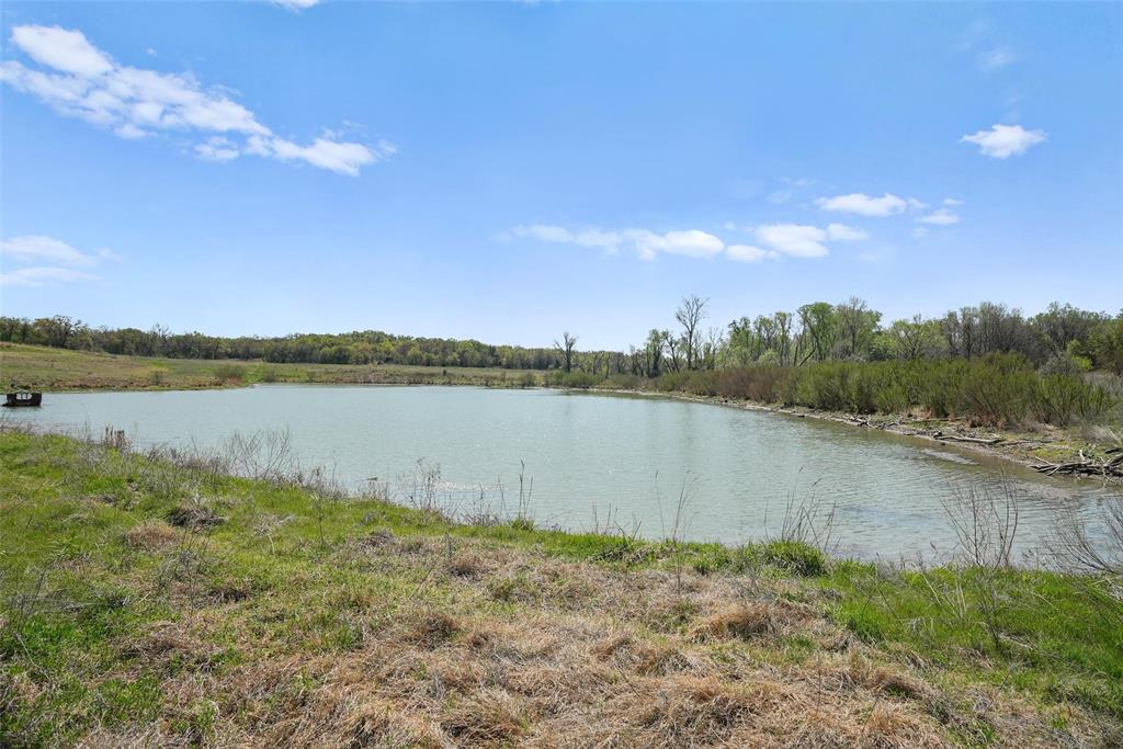 2202 County Road 3657 Springtown, TX 76082 - Photo 17 of 34 a view of lake with green space