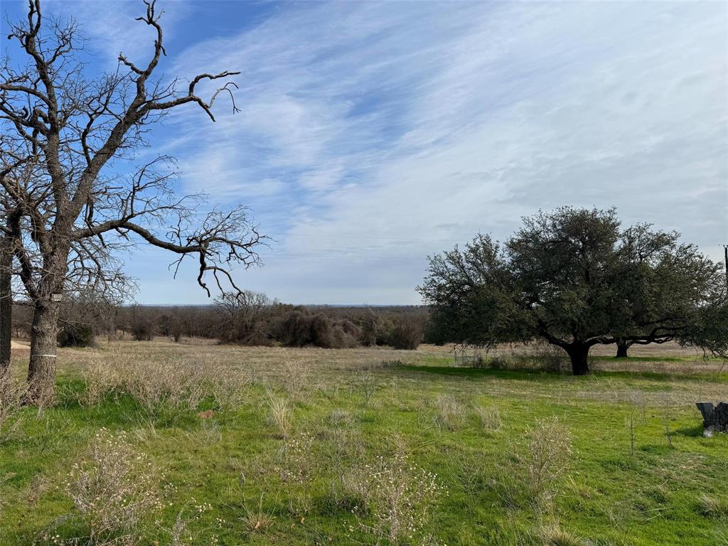 2202 County Road 3657 Springtown, TX 76082 - Photo 2 of 34 a view of swimming pool with a yard