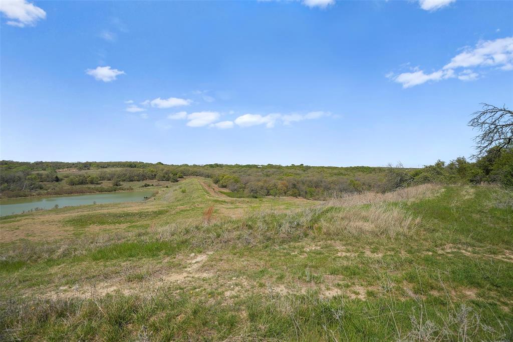 2202 County Road 3657 Springtown, TX 76082 - Photo 26 of 34 a view of an lake and a mountain