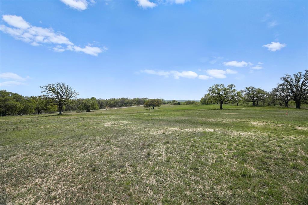 2202 County Road 3657 Springtown, TX 76082 - Photo 7 of 34 a view of a field with an ocean