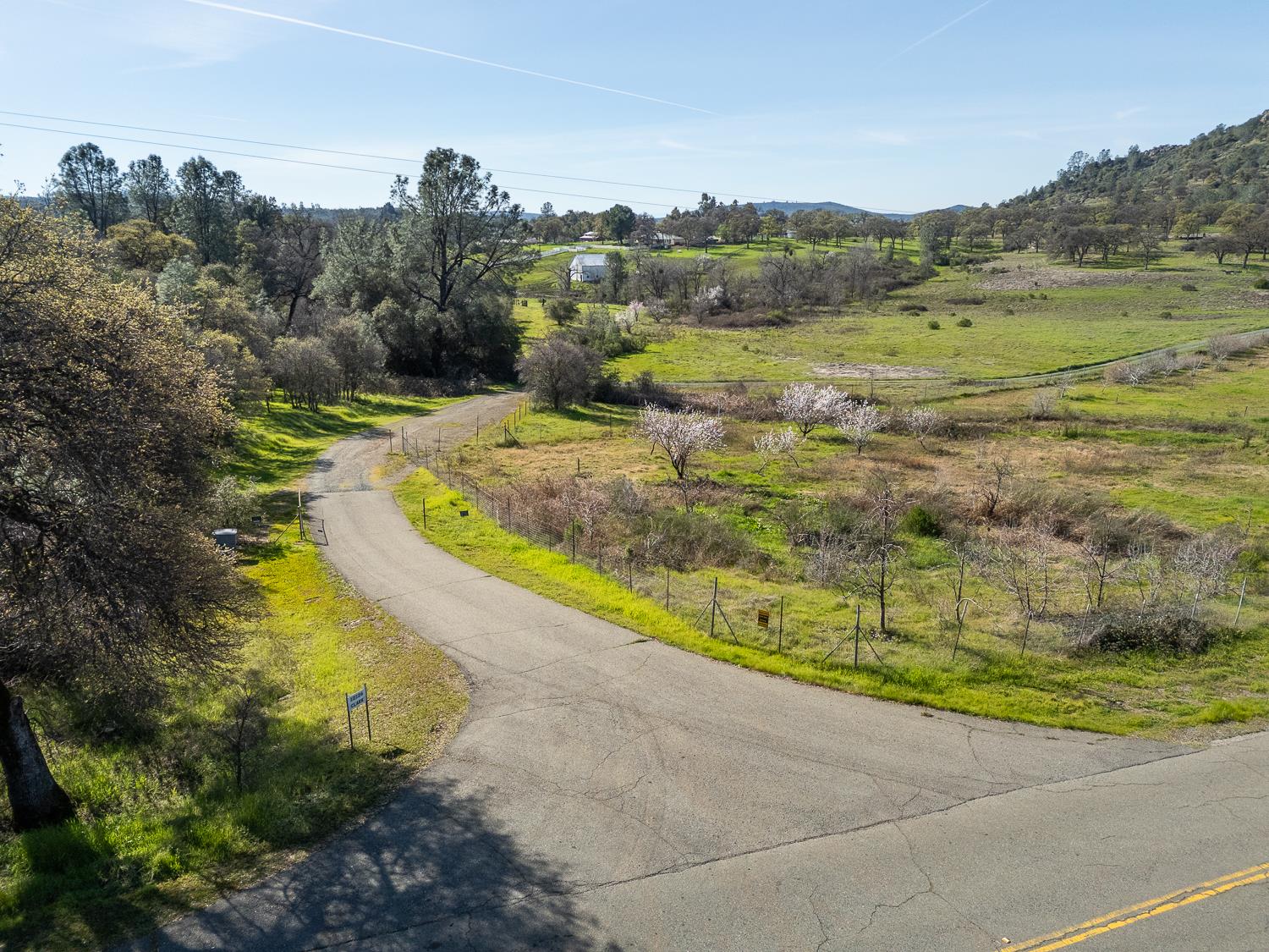 0 Marysville Road Browns Valley, CA 95901 - Photo 2 of 30 a view of a lake with a yard and large trees