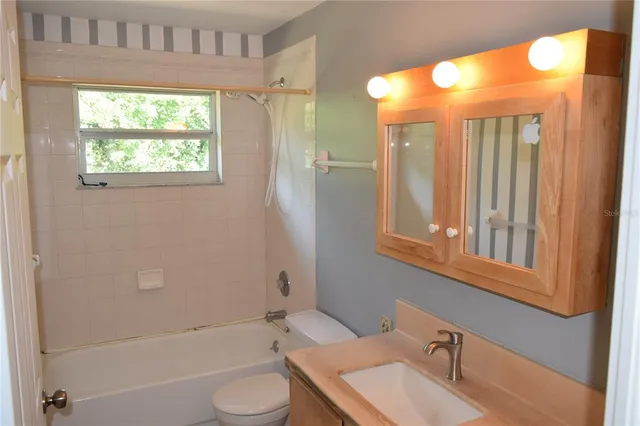 an empty room that has a window