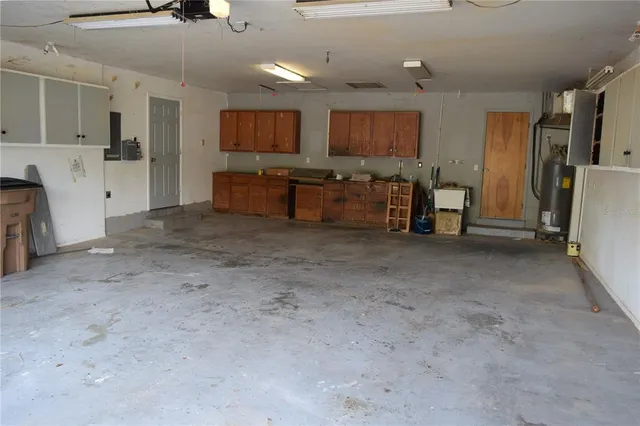 a view of a kitchen with a sink and dishwasher