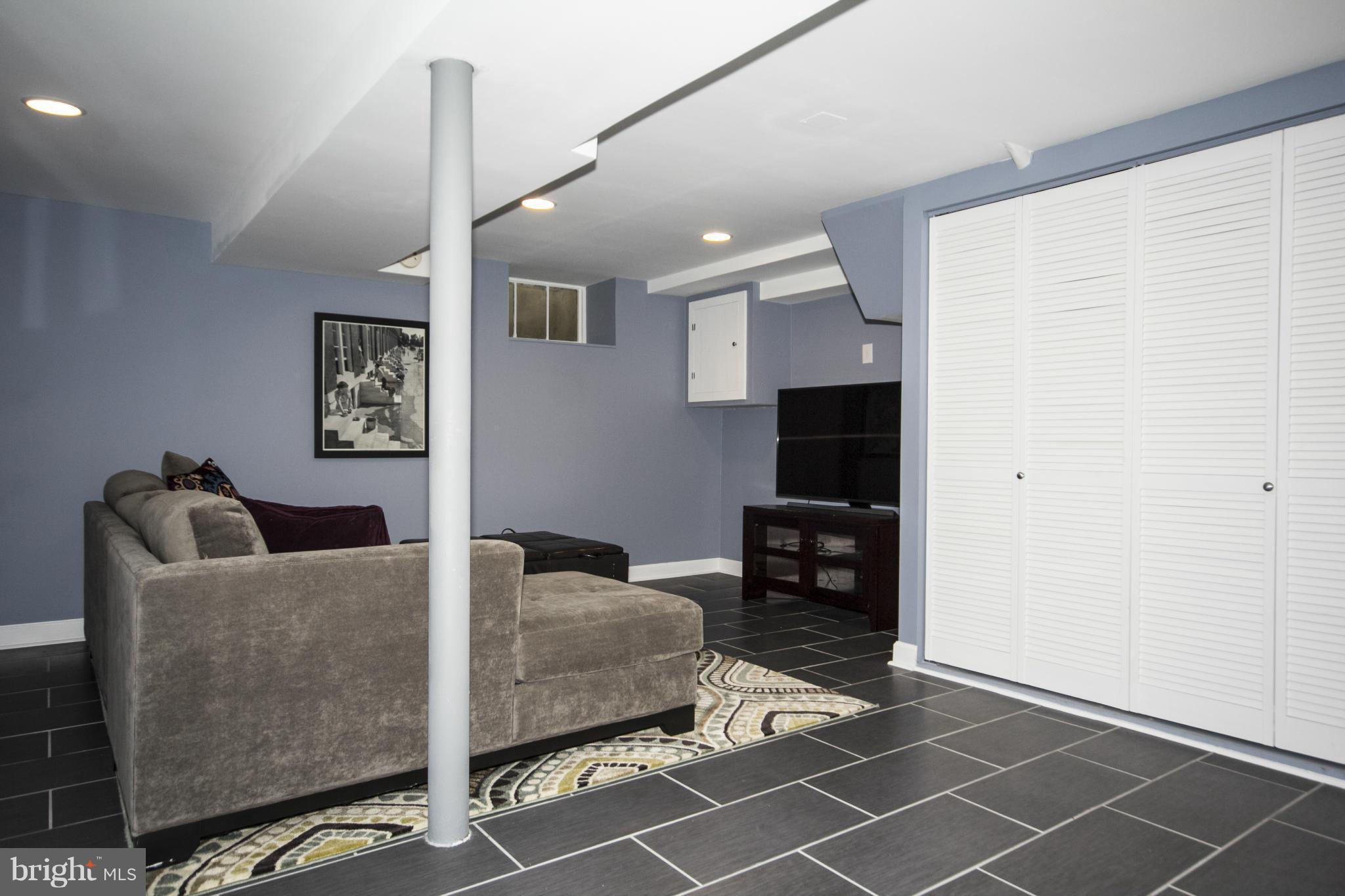 4029 Deepwood Road Baltimore, MD 21218 - Photo 14 of 30 Family Room with Ceramic Tile Floor