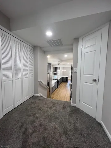 a view of a livingroom with a furniture