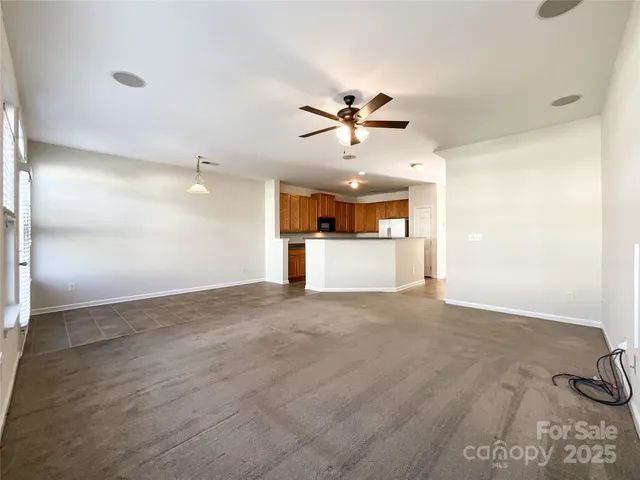a view of a hallway with staircase