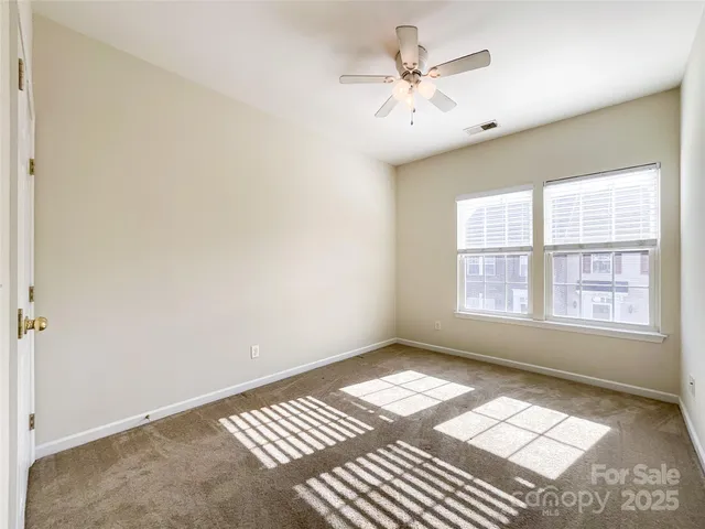 a view of a hallway with closet