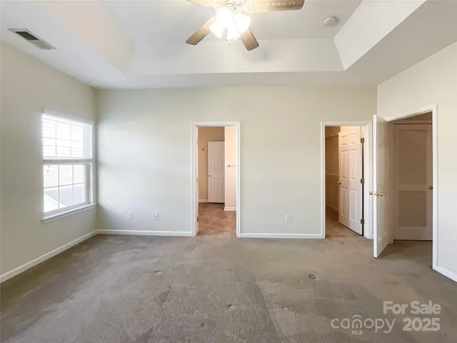 a view of a lake with a building in the background