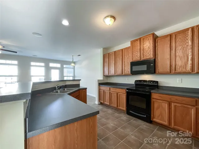 a view of an empty room with windows