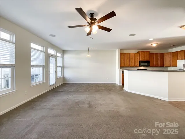 a view of a kitchen with a sink and a stove