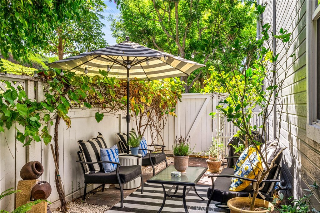 5 Surrey Farm Way Ladera Ranch, CA 92694 - Photo 15 of 46 Grapevines line this second outdoor sitting space.