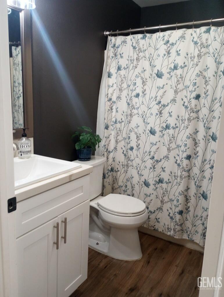 Undisclosed Address Bakersfield, CA 93313 - Photo 11 of 18 a bathroom with a sink and a toilet