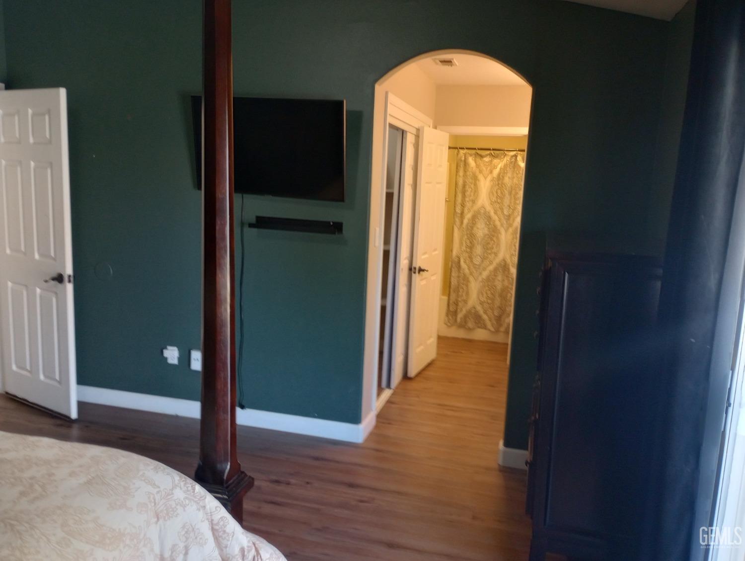 Undisclosed Address Bakersfield, CA 93313 - Photo 12 of 18 a view of a bedroom from a hallway