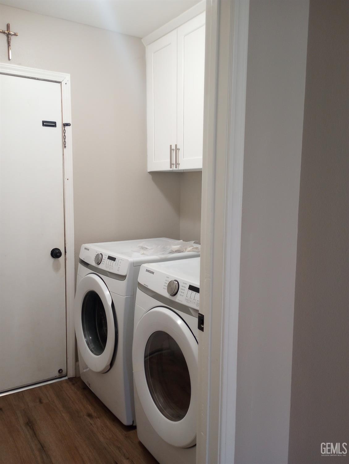 Undisclosed Address Bakersfield, CA 93313 - Photo 15 of 18 a utility room with dryer and washer