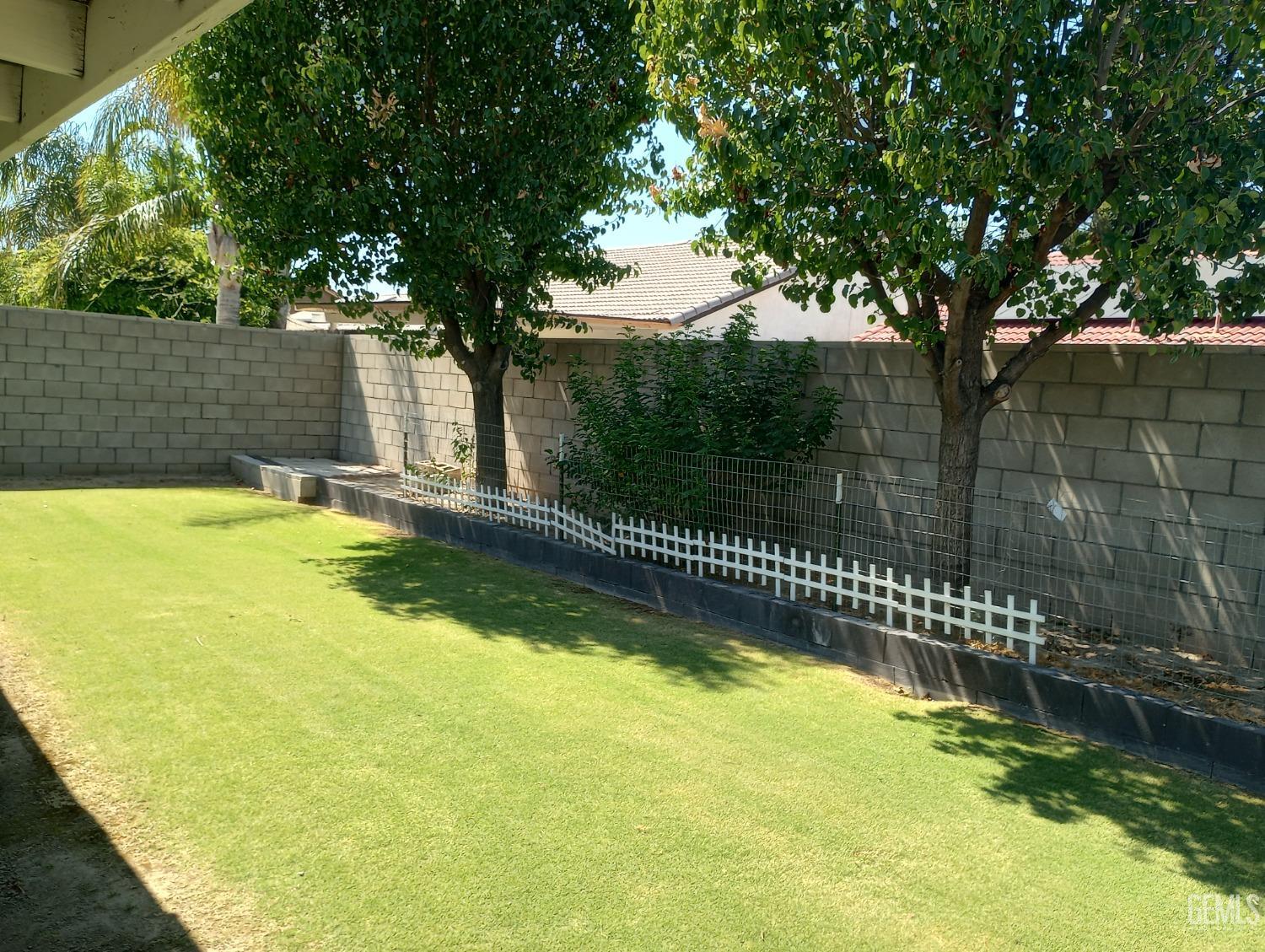 Undisclosed Address Bakersfield, CA 93313 - Photo 18 of 18 a view of a swimming pool with a patio