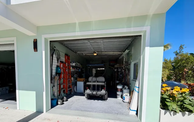 a room with lots of potted plants