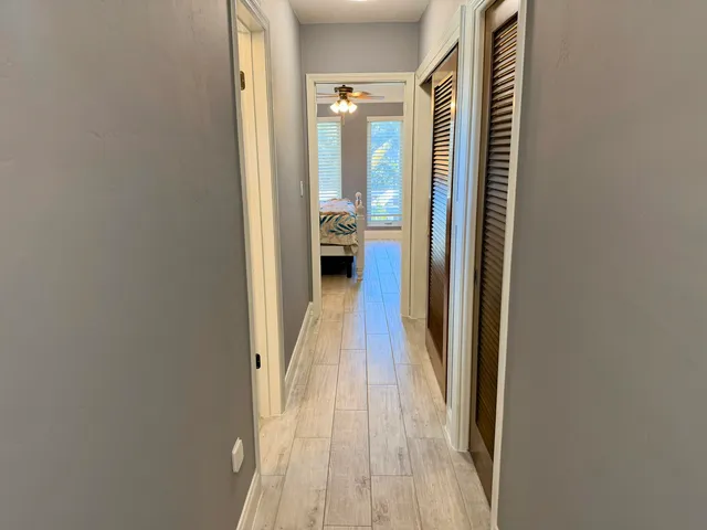 a view of a bathroom from the hallway