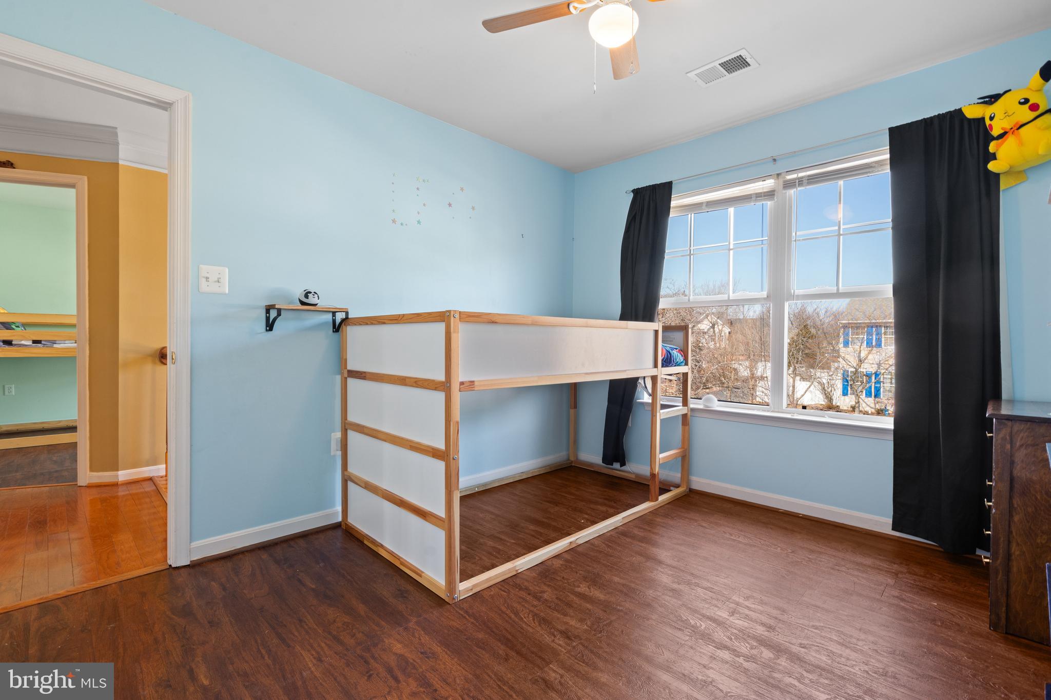 44 Hamstead Road Fredericksburg, VA 22405 - Photo 32 of 53 an empty room with wooden floor fan and windows