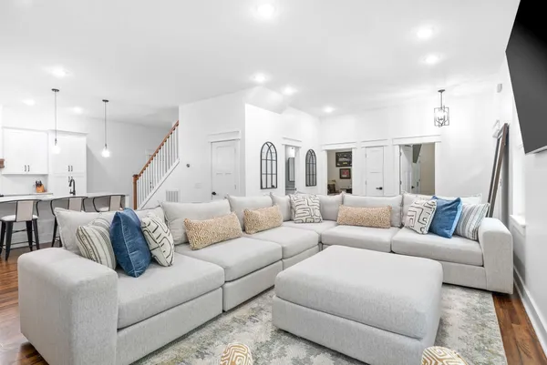 a close view of a stove a sink and dishwasher in a kitchen