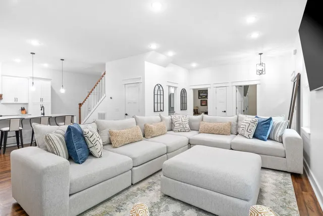a close view of a stove a sink and dishwasher in a kitchen