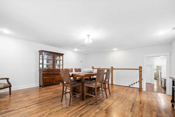 a bathroom with a double vanity sink mirror and shower