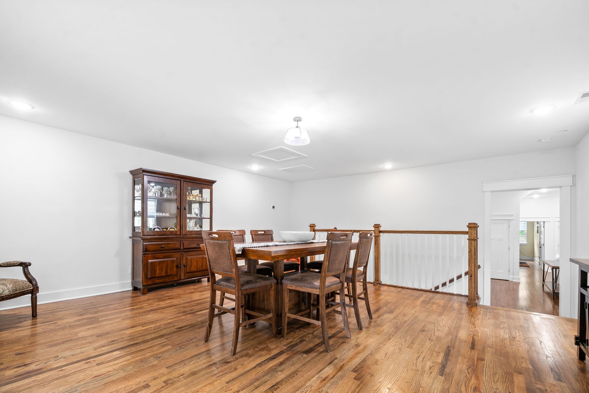 514 Doy Road White Bluff, TN 37187 - Photo 21 of 57 a view of a dining room with furniture and wooden floor