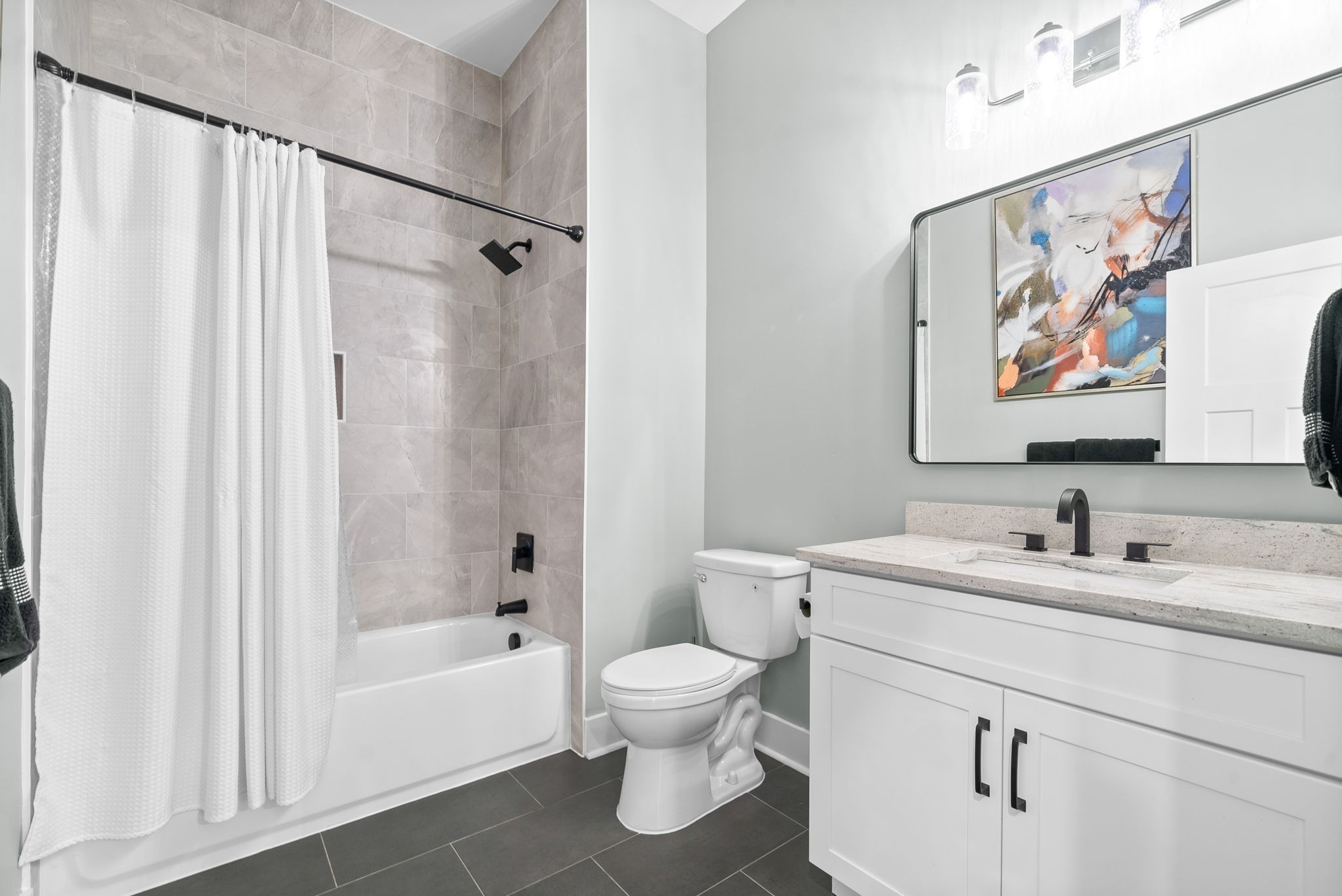 514 Doy Road White Bluff, TN 37187 - Photo 22 of 57 a bathroom with a toilet sink and a bathtub