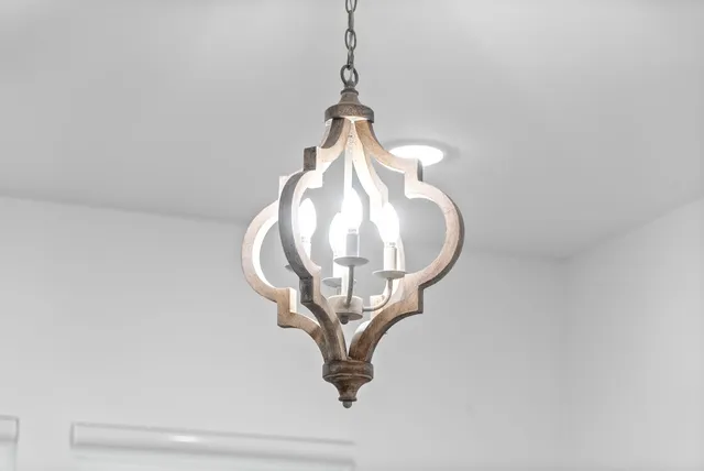 a bathroom with a granite countertop shower a toilet and a sink