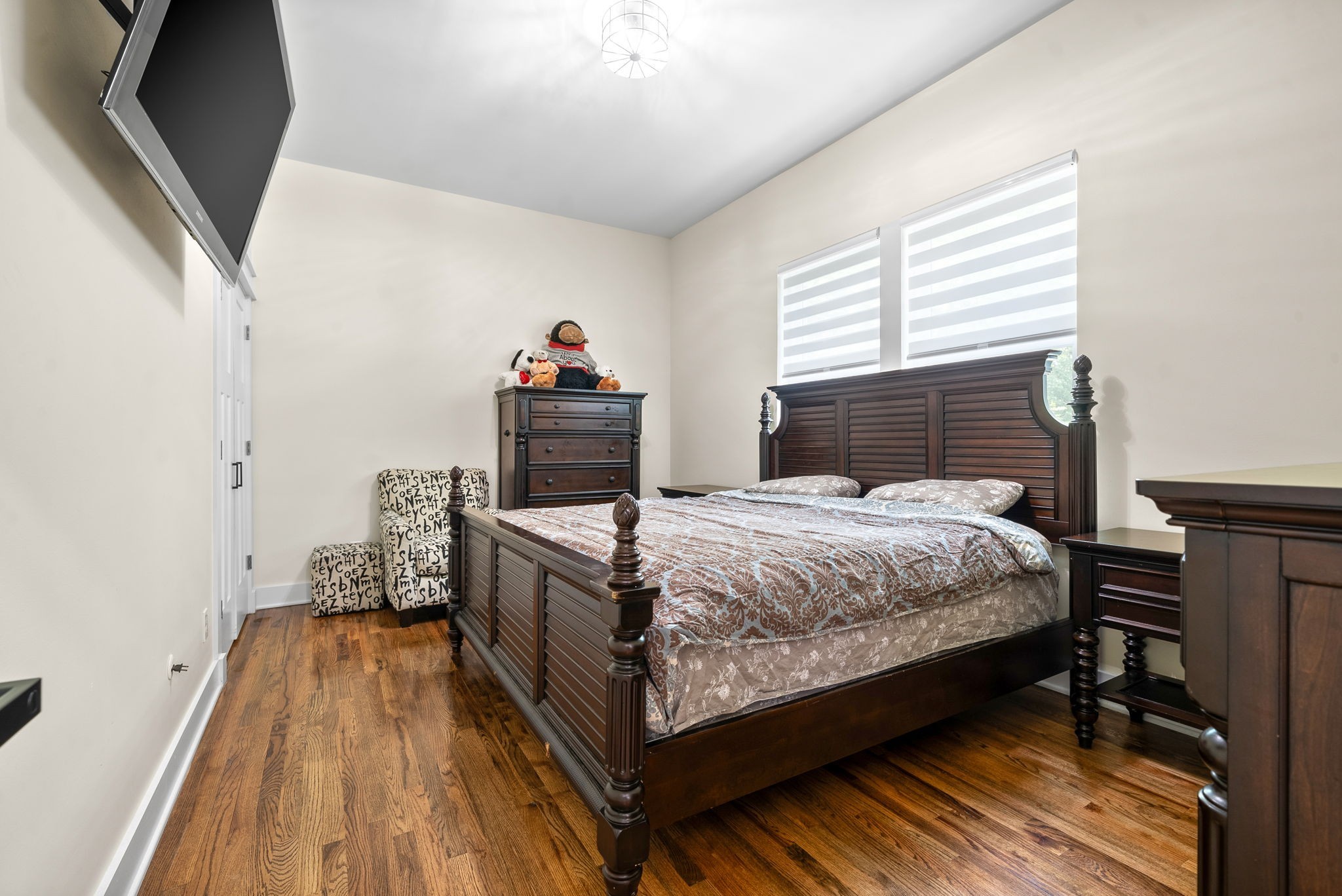 514 Doy Road White Bluff, TN 37187 - Photo 32 of 57 a bed sitting in a bedroom next to a window